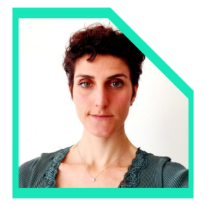 Woman wearing a green sweater.