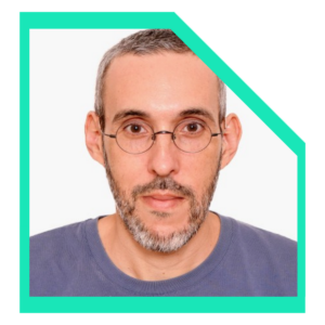 Men wearing a blue t-shirt and glasses.