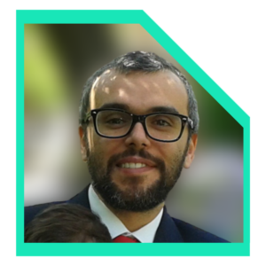 Men wearing a black blazer and glasses. 