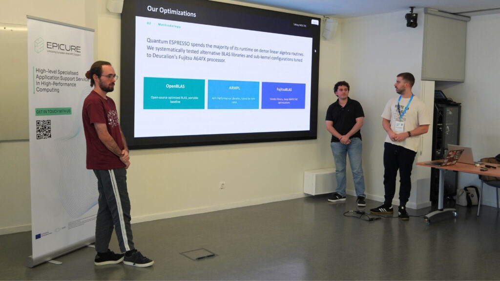 Team presenting optimisation results during an HPC workshop, standing beside a slide comparing BLAS libraries and performance approaches.
